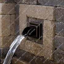Square bronze wall spout in-situ
