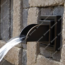 Square bronze wall spout in-situ