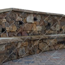 Bronze circular wall spout in-situ